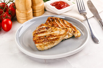 Grilled pork steak with sauce