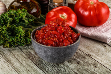 Diced ripe tomato with sauce