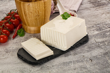 Soft Feta cheese piece with cut