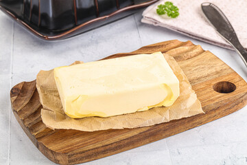 Dairy butter piece over board