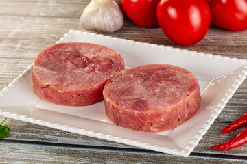 Raw round tuna fish fillet