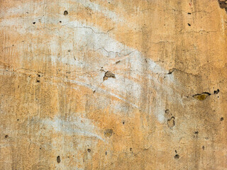 Aged beige stucco wall texture, weathered surface, grunge background, cracked plaster, distressed finish, textured, nobody, no people
