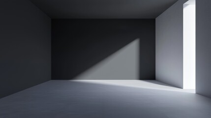 A minimalist room with a gray floor and walls, illuminated by a single light source.
