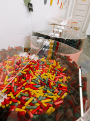 Colorful candy display showcasing various types of sweets in a vibrant shop setting
