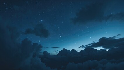 Fototapeta premium Night sky filled with stars and thick clouds