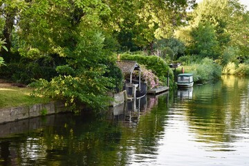 old wooden boat in canal on a sunny day