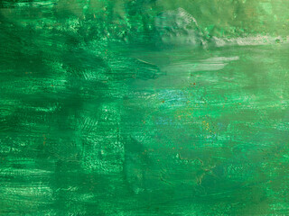 Green paint over white texture with brush strokes, layered paint on sheet steel