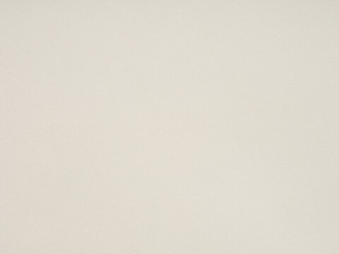 Unruffled whispers of ivory, the paper's texture promises tales untold amidst its understated canvas