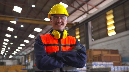 Professional asian man engineer and technician wearing safety helmet analyzing meeting in factory warehouse. Confident factory workers group inspection industry factory. Teamwork concept - Powered by Adobe