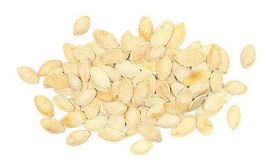 Pumpkin seeds, unshelled, roasted and salted pile isolated on white background, top view