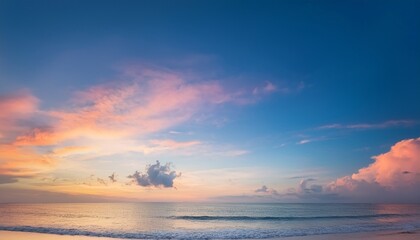 Fototapeta premium Vertical ratio size of sunset background sky with soft and blur pastel colored clouds gradient cloud on the beach resort nature sunrise peaceful morning Instagram toned style
