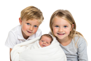 Sibling bonding with newborn baby wrapped in blanket during joyful family moments