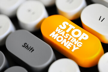 Stop Wasting Money is an imperative statement that advises someone to cease spending money carelessly or frivolously, text button on keyboard