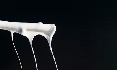 Dripping paint on a dark background