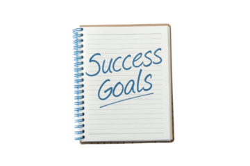 Success goals written in a notebook for personal development and motivation planning