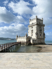 A beautiful view of the Belem Tower in Lisbon, Portugal, standing by the water.