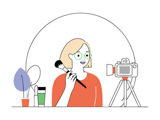 Beauty Influencer filming a makeup tutorial with cosmetics and camera