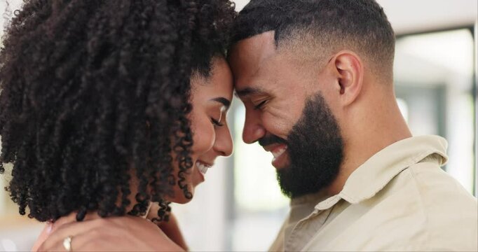 Happy couple, forehead and love for affection, support or care in embrace, romance or marriage at home. Face of man, woman or lovers with smile or touch for healthy relationship, bonding or moment