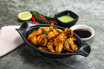 Vietnamese cuisine - fried frog with vegetables