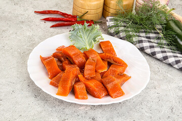 Red pickled herring fish fillet