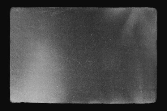  Abstract film texture background with grain, dust and light leak, framed, pattern with copy space.