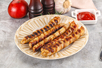 Grilled meat sausages wrapped bacon