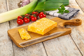 Marble yellow cheese with slices