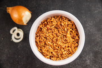 Oonion crispy fried onions vegetables dish fresh delicious gourmet food background on table rustic food top view copy space