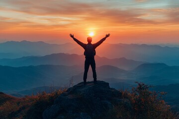Silhouette of positive man on mountain top, with arms raised up, silhouette of man standing on the hill, Business, success,victory,leadership,achievement concept. Freedom travel