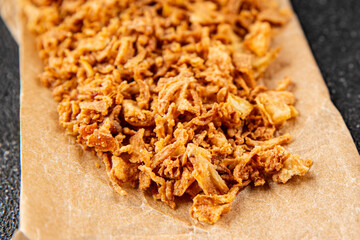 Oonion crispy fried onions vegetables dish fresh delicious gourmet food background on table rustic food top view copy space