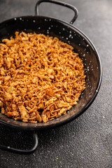 Oonion crispy fried onions vegetables dish fresh delicious gourmet food background on table rustic food top view copy space