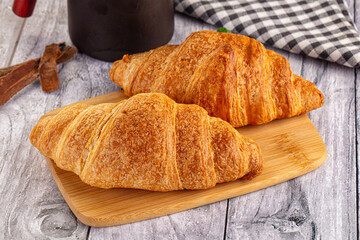 Fresh hot homemade croissant for breakfast