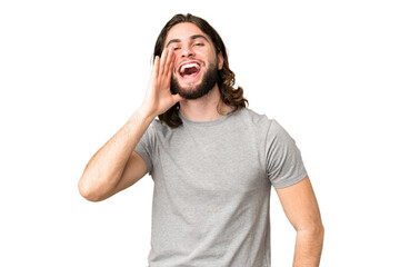 Fototapeta premium Young handsome man over isolated chroma key background shouting with mouth wide open