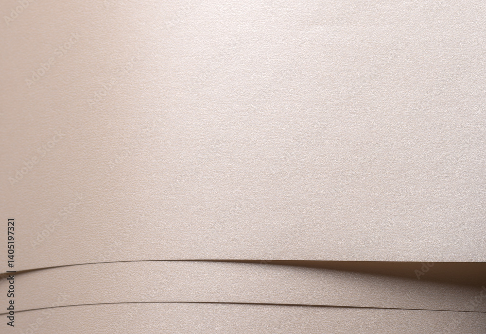 Aufkleber Background with satin paper texture. Layered horizontal strips in champagne, beige, pale gold. Glossy pearlescent surface with soft tone, elegant premium finish, minimalistic design..