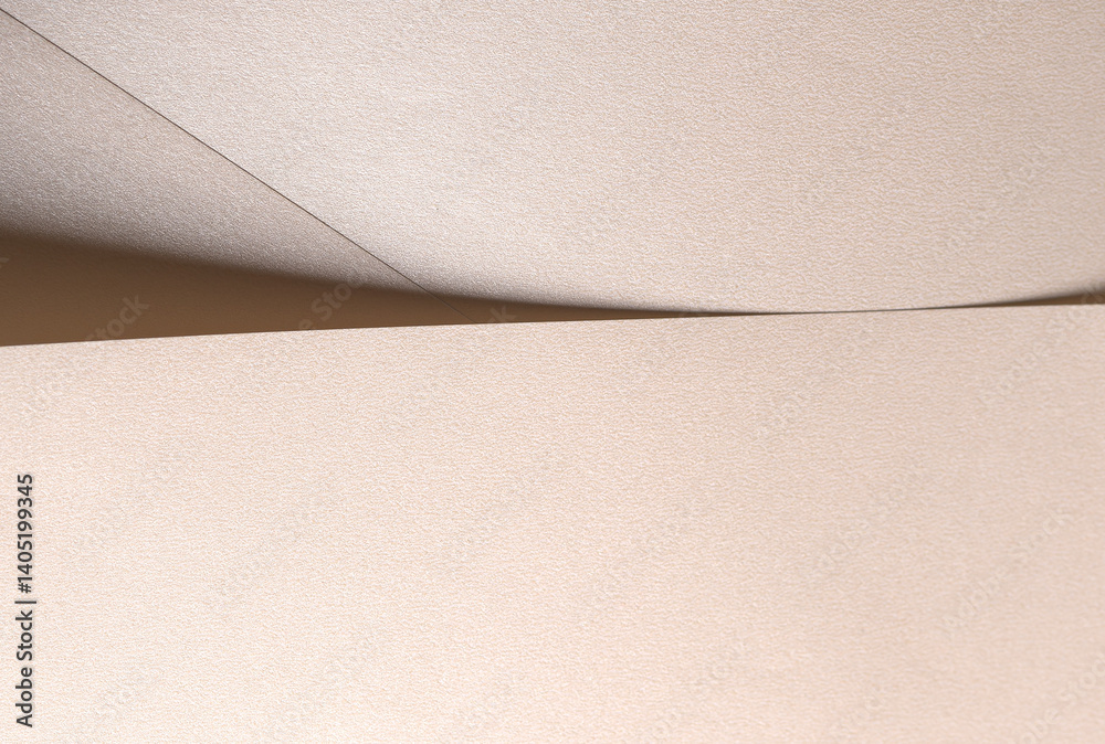 Poster champagne beige paper background with a pearlescent satin texture and soft, graceful folds. pale gol