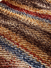 textile square background - colorful woven yarns of boucle fabric close up