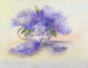 A bouquet of lilacs in a porcelain vase