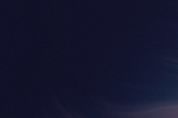 Abstract dark blue background with subtle gradients and blurred textures creating a sense of depth and mystery