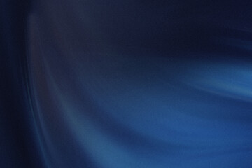 Abstract dark blue background with blurred light creating a soft and dreamy ethereal atmosphere visual