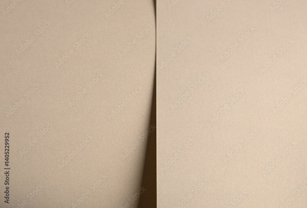 Poster Paper background with matte texture. Smooth golden beige surface in soft pastel hue, grainy structure with gentle divide, natural composition, elegant muted tone, refined design..