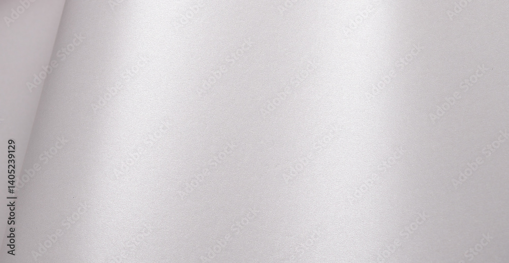 Aufkleber satin paper background with a pearlescent, glossy texture and smooth surface. pale silver and icy gr