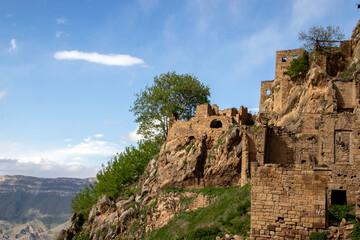  View of the settlement Gamsutl - an ancient village in Dagestan at an altitude of 1500 meters above sea level. At present, the settlement has been abandoned by people. The ghost village is unique 
