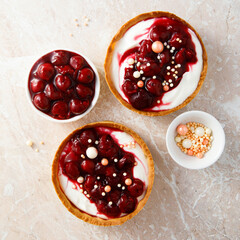 Cream cheese tarts with cherries