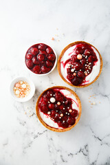 Cream cheese tarts with cherries