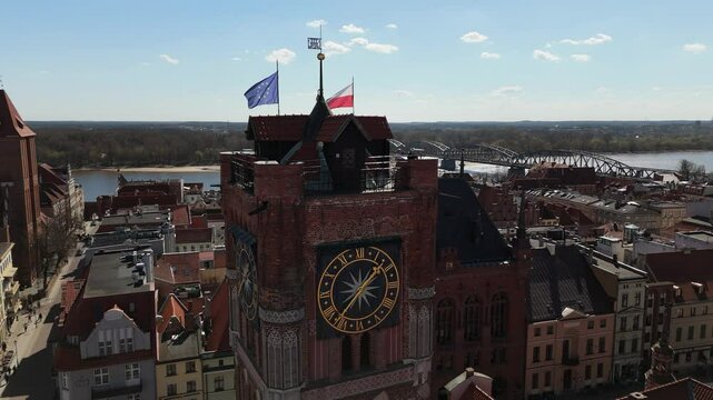 Aerial view on sunny day of historical tourist center of medieval city Torun, old town, town hall, churches, cathedrals, Poland, Europe