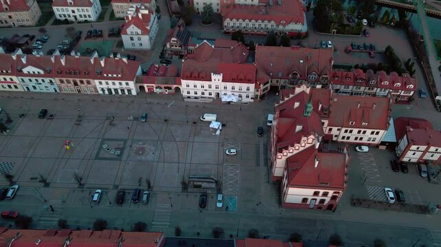 Pisz, townhall, Poland, Masuria, aerial, drone, topdown, square, historic, architecture, redroof, plaza, civic, urban, structure, landmark, municipal, Europe, travel, tourism, twilight, spring, buildi
