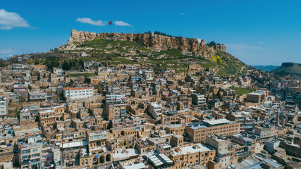 Fototapeta premium Mardin old town. Ancient and stone houses of Old Mardin. Mardin castle and city center. Turkiye.