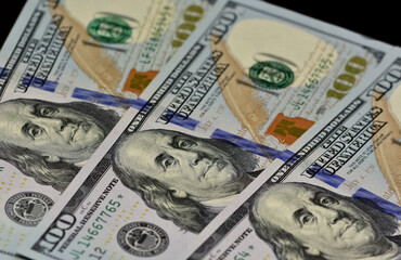 banknotes of various countries. photos of american dollars.