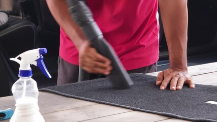 The professional car carpet cleaning process in action ensuring a spotless and fresh appearance