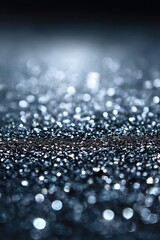 An eye-catching wallpaper showcasing a silver glitter design on a smooth dark backdrop. The layout incorporates limited dark areas, making the sparkling silver glitter pop elegantly.